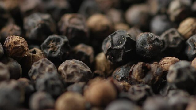 Dried Black Peppercorns Falling, Extreme Close Up Of Pepper Spice Seeds