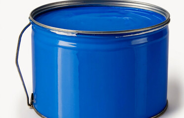 Large open can of blue paint, cut out on white background