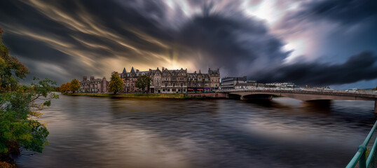Inverness is a city on the northeast coast of Scotland, where the River Ness connects with the Moray Firth. It is the largest city and cultural capital of the Scottish Highlands - obrazy, fototapety, plakaty