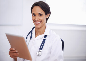 Portrait, doctor and happy woman with tablet in hospital for healthcare, wellness or telehealth...