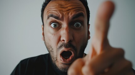 Man Making a Face With His Fingers