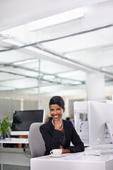 Business, portrait and happy Indian woman with computer in office for email, reading or planning with coffee. Smile, face and female consultant with pc for research, report or client communication