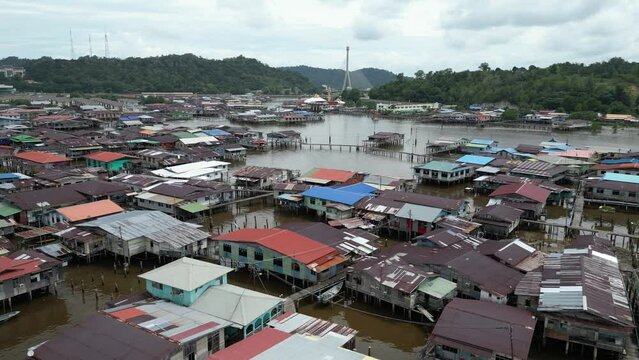 aerial drone shot of stilted homes and boardwalks on the river in the floating villages of Kampong Ayer in Bandar Seri Bagawan in Brunei Darussalam
