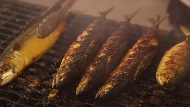 grilling fish at the night market in Bandar Seri Bagawan in Brunei Darussalam