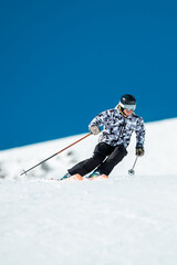 Expert skier on the slopes of Grandvalira in Andorra in Winter 2024