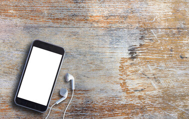 Smart phone on old wooden background