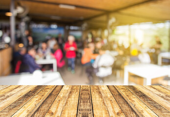 Selected focus perspective wood table with blur background