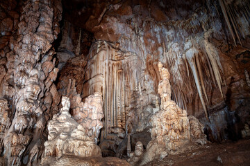 Beautiful stone columns, stalactites and stalagmites in a cave