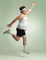 Overweight, man and studio workout and excited, jumping or weight loss and health for energy. Diet, training or wellness in male person, isolated on white background for body positivity and fitness