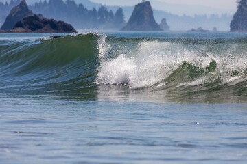 Beautiful waves in the Pacific Ocean at Ruby Beach, Washington, captured in hot summer day