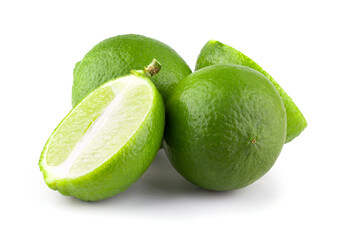 Whole and sliced limes, Sour green fruit isolated on a white background.