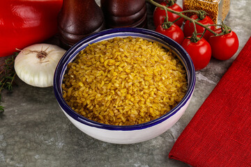 Dry wheat bulgur cereal heap