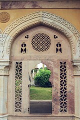 Intricately Carved Stone Frieze on medieval  cenotaph Wall in Broad Daylight at maharani ki chhatri...
