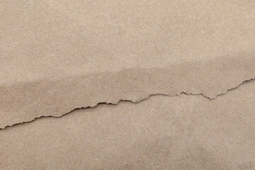 parcel brown for background, torn paper carton texture in top view, brown paper craft empty