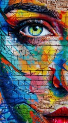 Detailed and colorful graffiti of a half human face with an eye, painted on a brick wall, representing urban street art.