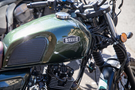Bullit motorycles ffty hero logo brand and sign text on fuel tank green of motorcycle