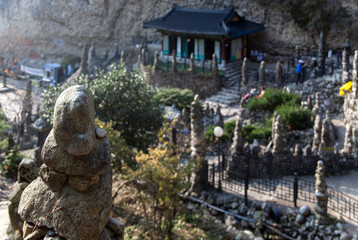 Fototapeta premium High-angle view of the Buddhist temple with the pagoda of stacked stones