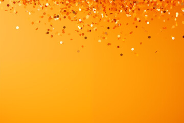 Falling confetti on orange color background, celebration concept