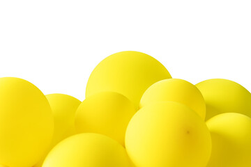 A bunch of yellow balloons floating on a white isolated background. The balloons are of similar...