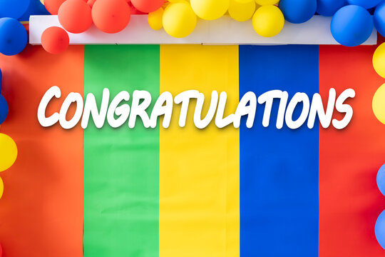 A colorful congratulations image with balloons. A festive image celebrating a special occasion.