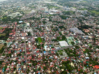 Top view of buildings and streets with cars in Iloilo City. Panay Island. Philippines.