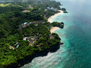 Aerial view of Beach Resorts with white sand and crystal clear water with sun reflection. Boracay,...