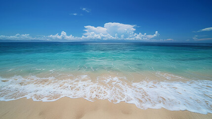 Serene beachscape with azure waters and clear sky at tranquil seaside