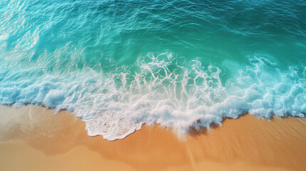 Fototapeta na wymiar Aerial view of turquoise waves crashing on sunny sandy beach