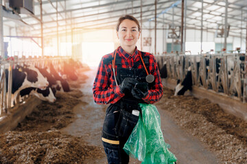 Concept modern technology of livestock farming cattle 4.0 industry. Portrait happy young woman...