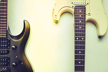 Two rock fusion funky guitars, neck fretboard on a white.Black, white, brown.  - obrazy, fototapety, plakaty