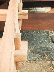 carpenter working with wood Wooden staircase is step.Use the method of Wooden wedge.