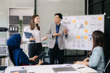 Creative business people working on business project in office.