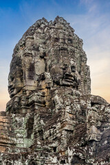 Ancient Bayon temple complex in the center of Angkor Thom in Cambodia.