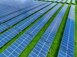 Solar farm and sun light. Solar power for green energy. Sustainable renewable energy. Photovoltaic...