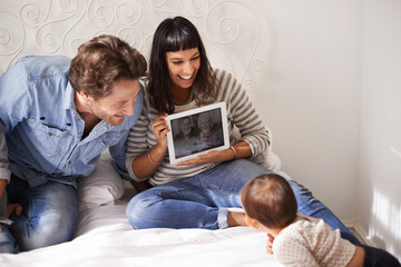 Family, child and toddler for video call in bedroom, internet and happy for grandparents on screen. Parents, baby and security in connection or laugh, communication and love or online for bonding - Powered by Adobe