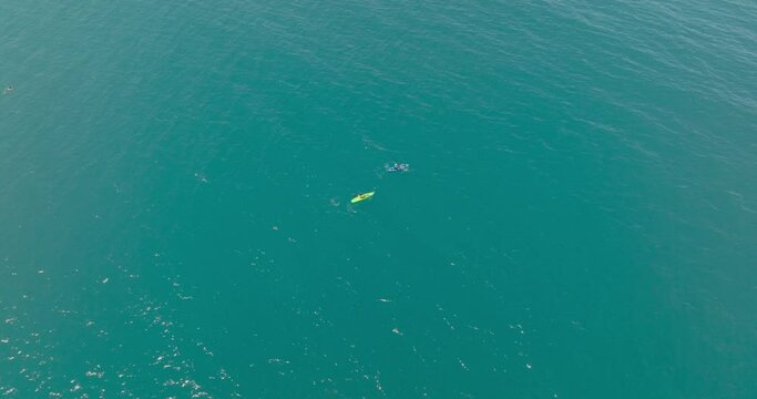 Aerial view of two canoes in the sea, Milazzo, Sicily, Italy.