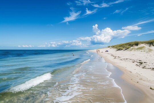 /imagine A sun-kissed beach in Denmark, with golden sands stretching as far as the eye can see. Children play in the shallow waters, while families picnic on the grassy dunes.