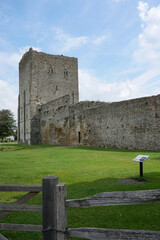Medieval fortification castle in Portchester England. stone remains of historic building. Tourist...