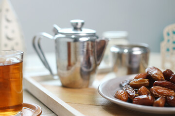 Dates fruits and hot tea. Food to break fast during holy month of Ramadan.