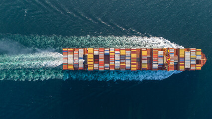 Aerial top view of cargo ship with contrail in the ocean sea ship carrying container and running from container international port smart freight shipping by ship service, webinar banner.