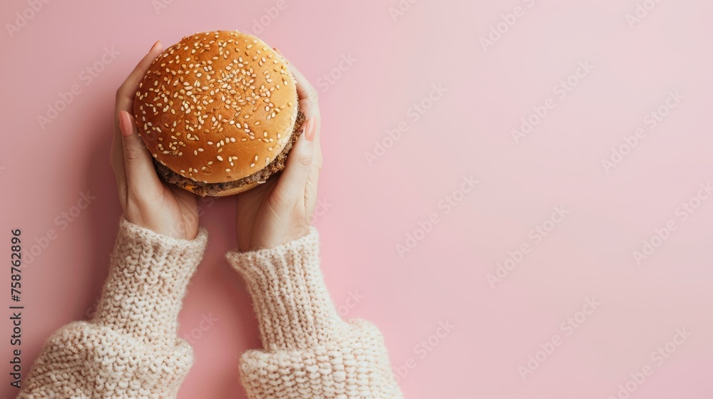 Poster hands holding burger on vibrant backdrop with generous room for custom text placement