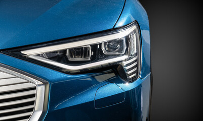 Blue car headlight close-up - 758767414