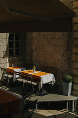 Empty cafe on a street in Dubrovnik old town, Croatia. Travel destination in Croatia.