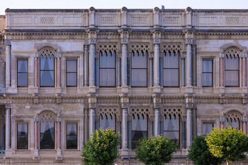 View from the water of the Bosphorus Strait to ancient palaces and buildings. Public place on the street of Istanbul, Türkiye.