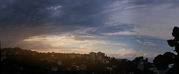 Evening view of the city. Sunset sky and beautiful landscape.