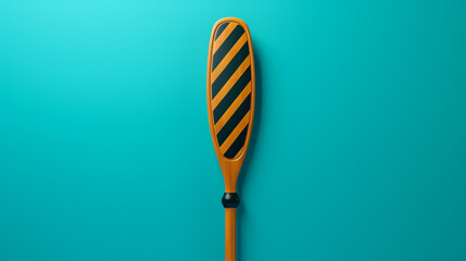 A paddleboard paddle positioned against a turquoise backdrop. - obrazy, fototapety, plakaty
