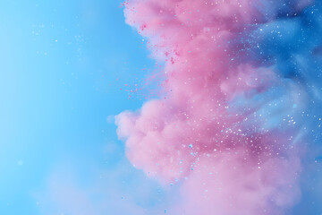 Fototapeta premium Explosion of blue and pink dust or paint, blue and pink pastel paints on a blue background, space for text