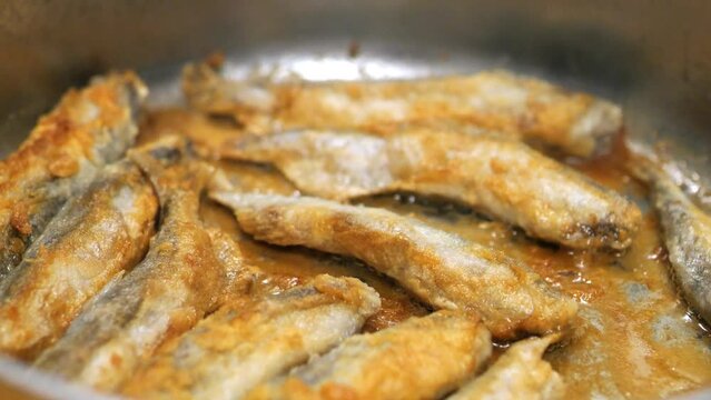 Fried Fish In Pan. Fish Frying In Oil. Roasted Seafood Cuisine 4K