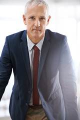 Leadership, portrait and mature businessman, serious ceo or senior manager at corporate startup office. Trust, confidence and face of business owner, boss or proud entrepreneur at professional agency