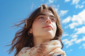 image of a beautiful blue sky and a woman with flawless makeup